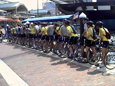The riders dip their back tires into the Baltimore Harbor. When the riders reach San Fransico, they will dip their front tires into the Bay signifying the end of their journey.