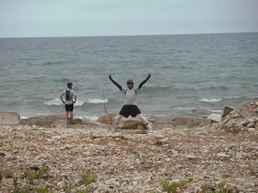 Travis and Mark celebrate our arrival at Lake Michigan.