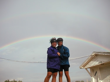 Sarah and Birthday Girl Ashley R. pose under a rainbow in northeast Illinois.