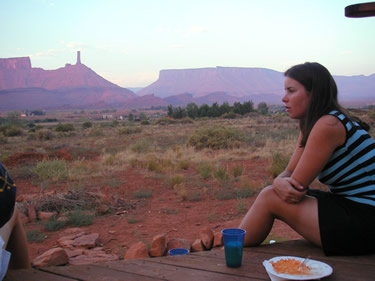 Steph watches the sun set in Moab, UT