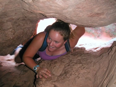 Kelly crawls through an arch called, conveniently, 
Crawl-Through Arch.