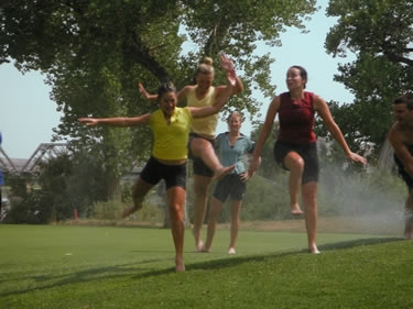 We frolicked in the sprinklers on a golf course near the Green River Campground--until The Man made us stop.