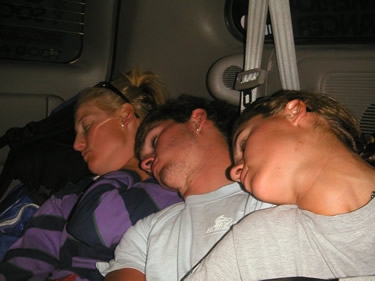 Blair, Ryan, and Leah pass out in the van after a long
day of biking.
