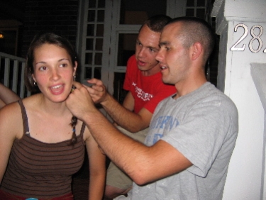 Dan and Rob chop off Renee's hair for Locks of Love.