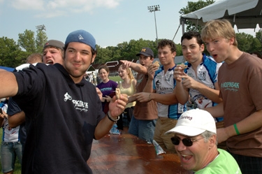 the guys competing at the pie-eating contest